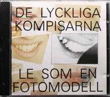 DLK DE LYCKLIGA KOMPISARNA Le Som En Fotomodell 1991 Album CD